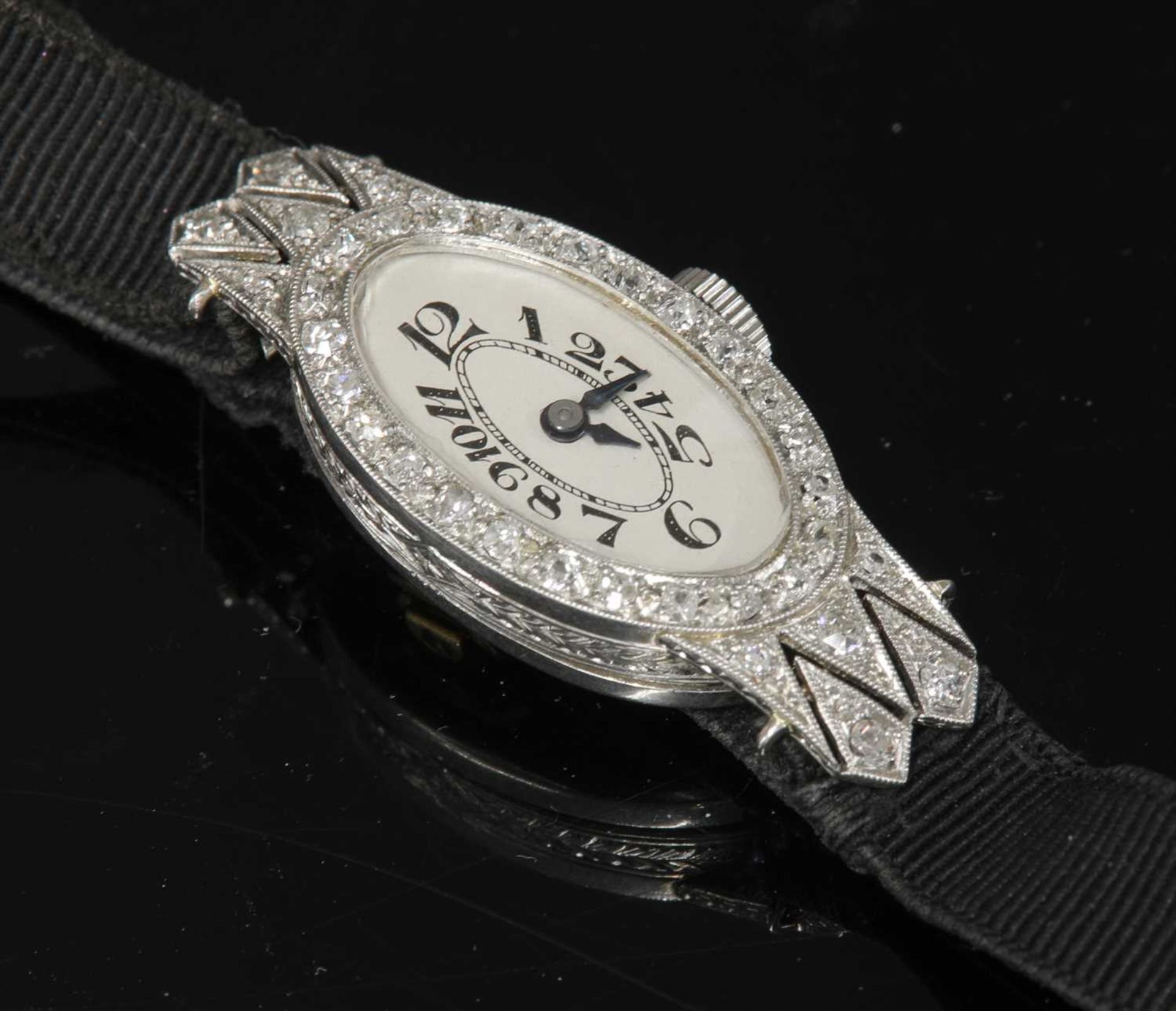 A ladies' Art Deco diamond set mechanical cocktail watch, c.1925,