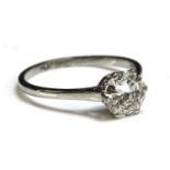 A platinum single stone diamond ring,