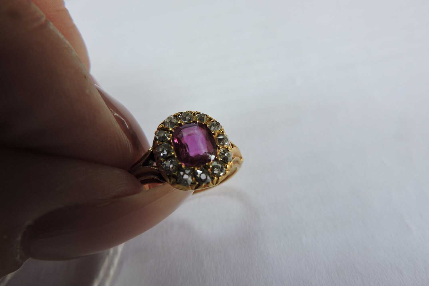 A late Victorian ruby and diamond cushion-shaped cluster ring, - Image 4 of 7