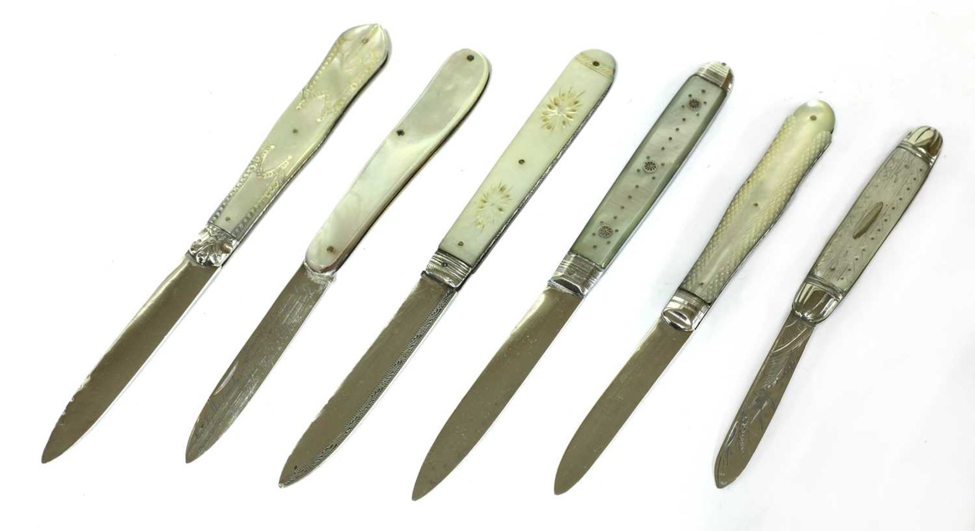 Six silver and mother-of-pearl folding fruit knives,