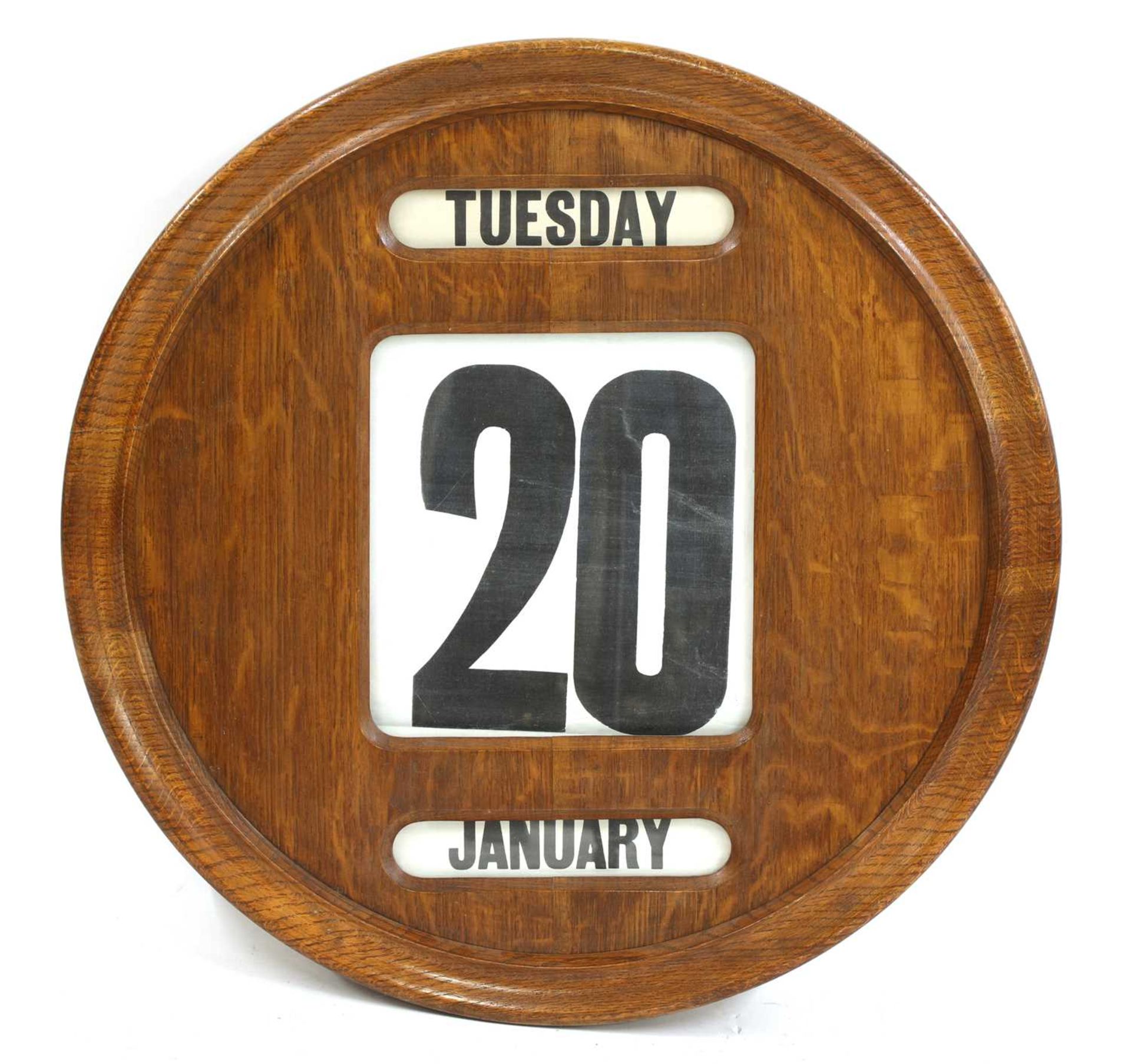 A large Edwardian oak wall-mounted perpetual calendar,