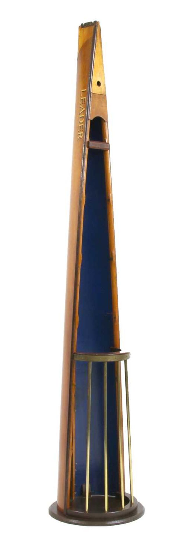 A teak and brass stick stand,