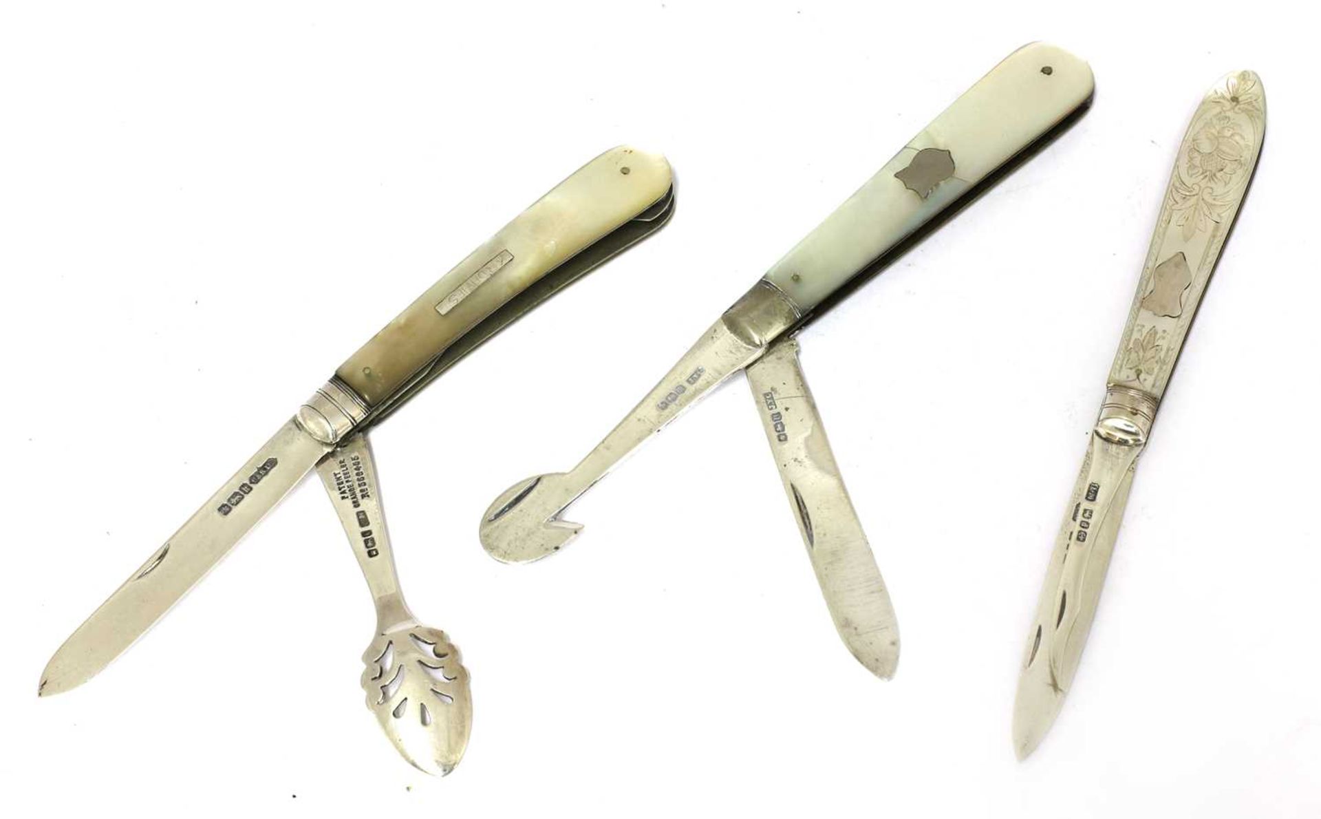 Three silver and mother-of-pearl combination folding fruit knives,