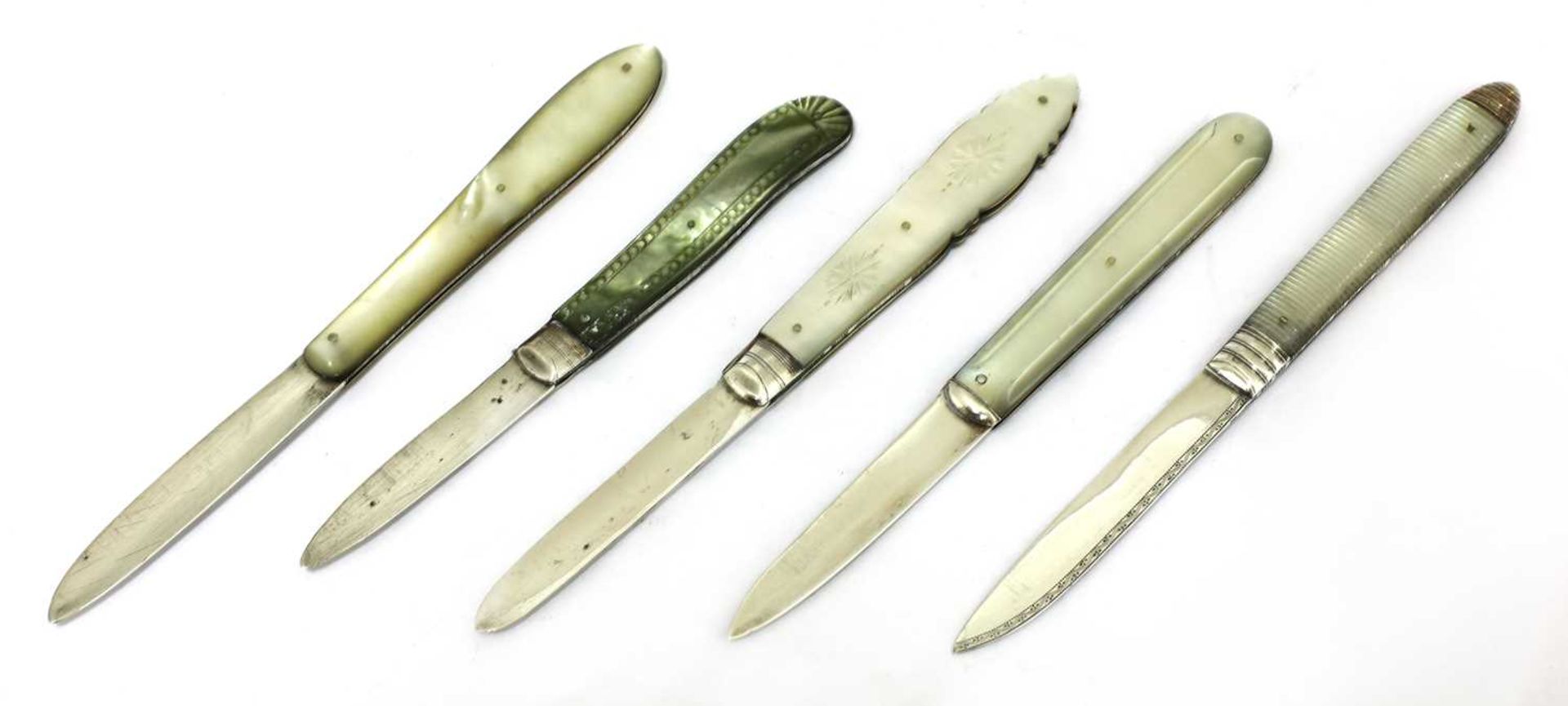 Five silver and mother-of-pearl folding fruit knives,