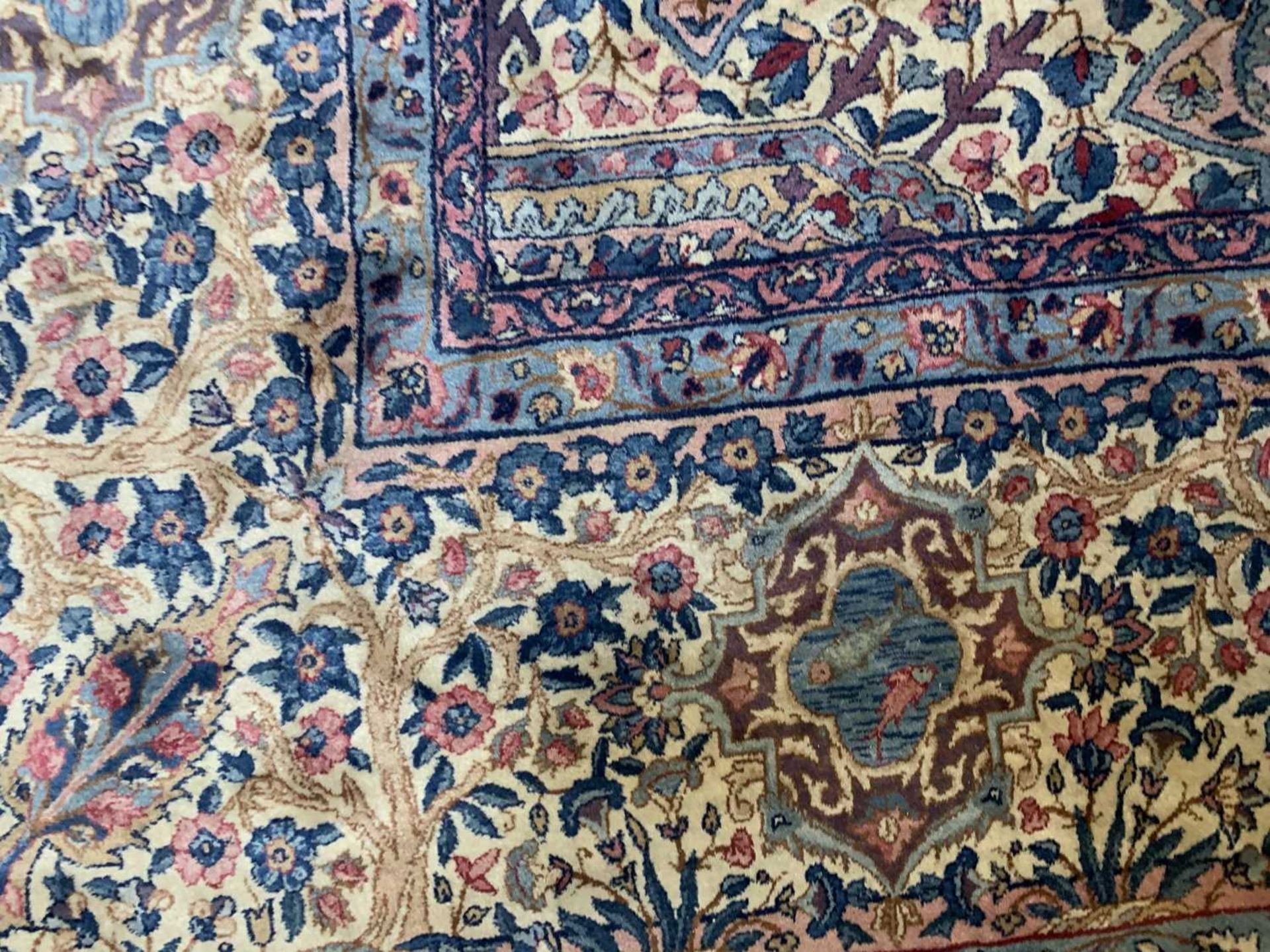 A large Persian Kirman carpet, - Image 3 of 18