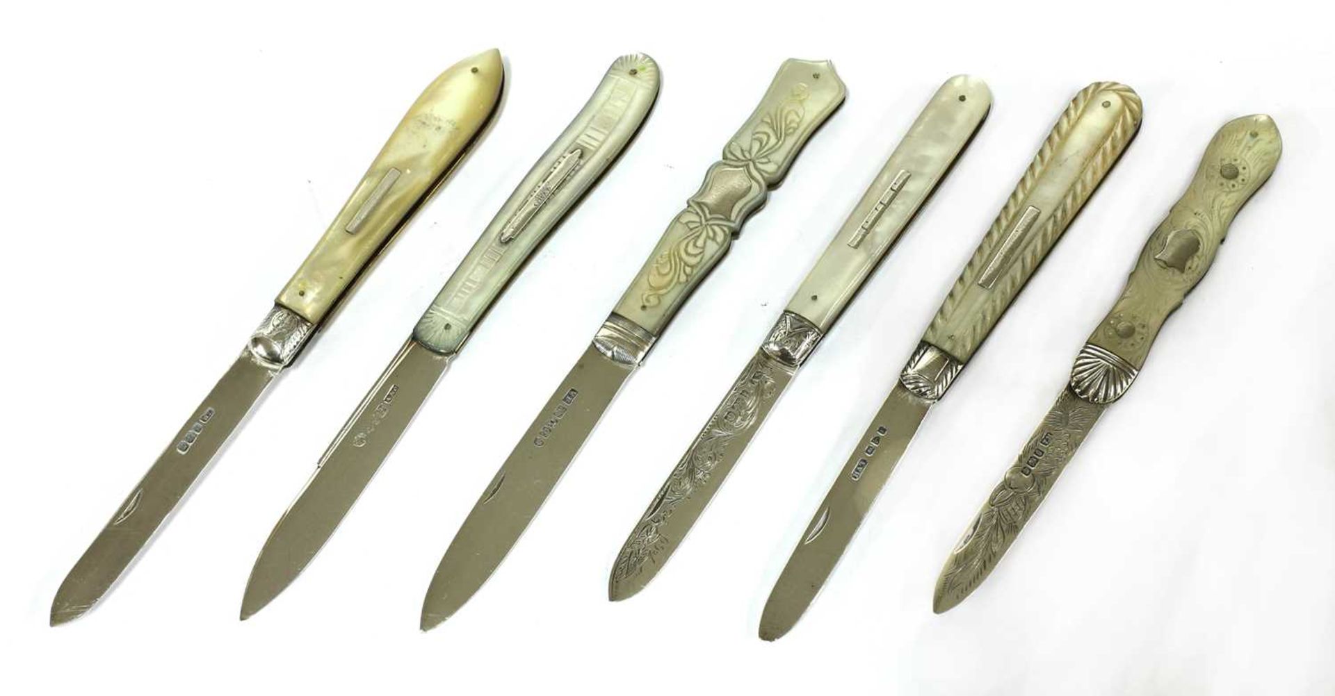 Six silver and mother-of-pearl folding fruit knives,