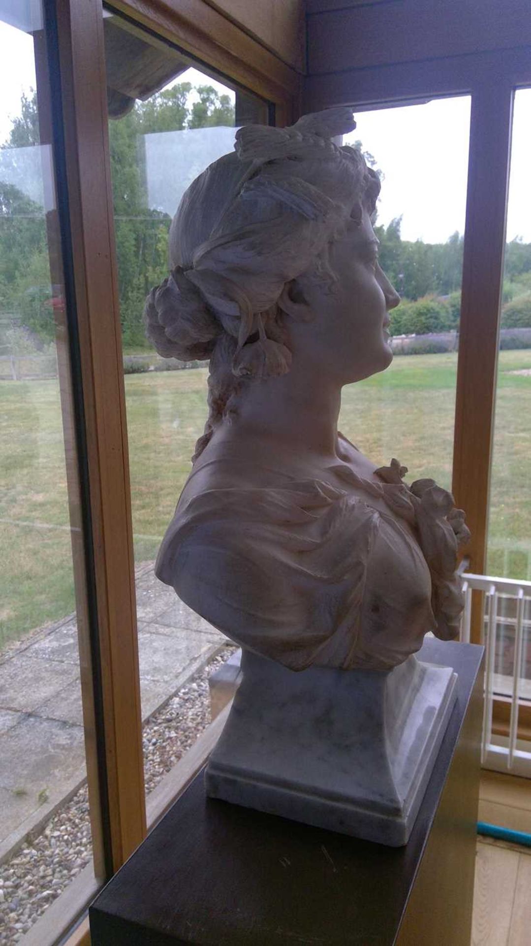 A carved marble bust emblematic of Flora, - Image 5 of 32