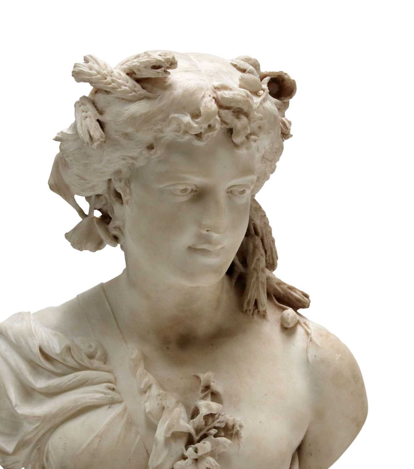 A carved marble bust emblematic of Flora,
