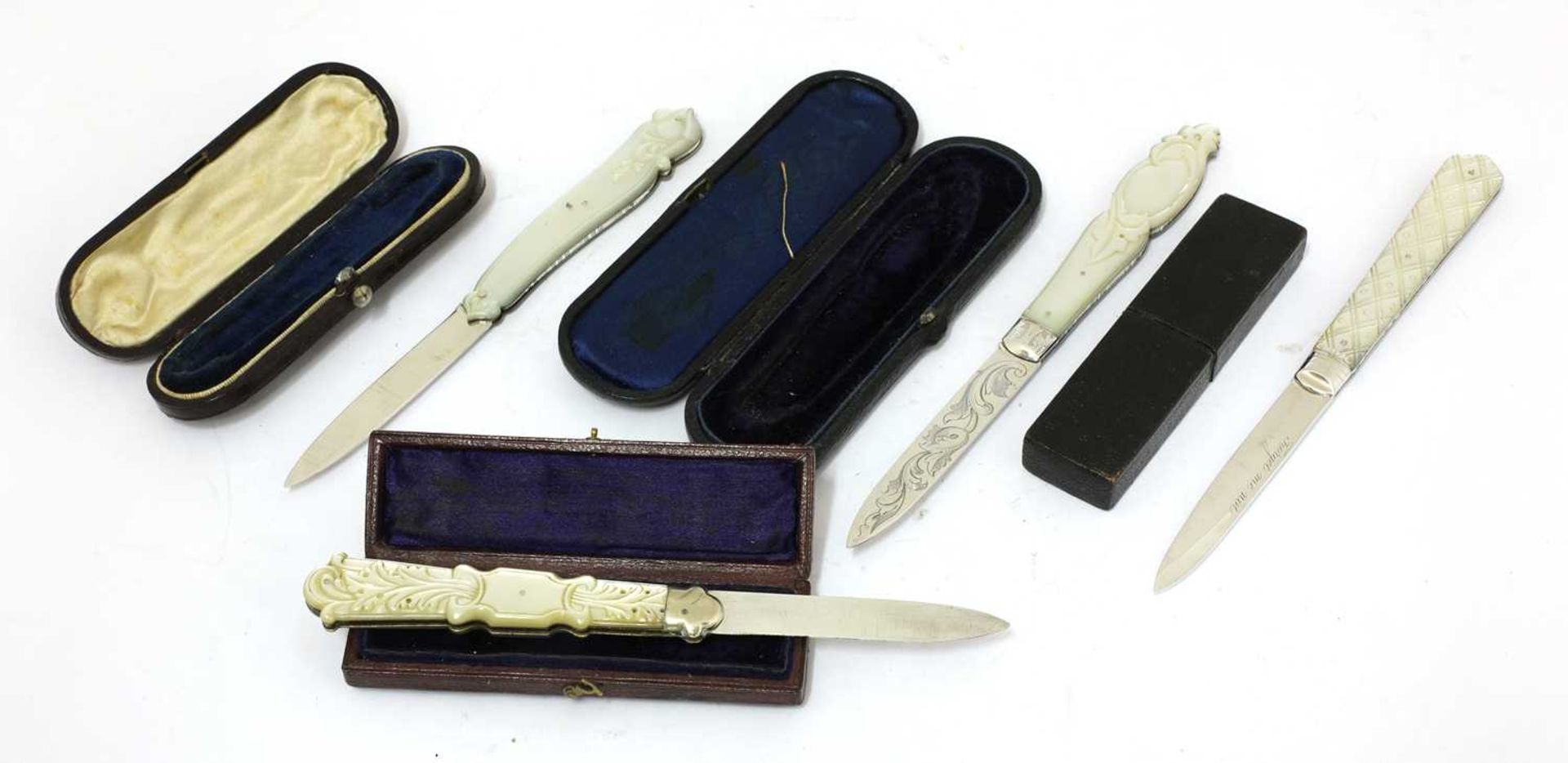 Four Victorian carved mother-of-pearl and silver folding fruit knives, - Bild 2 aus 2