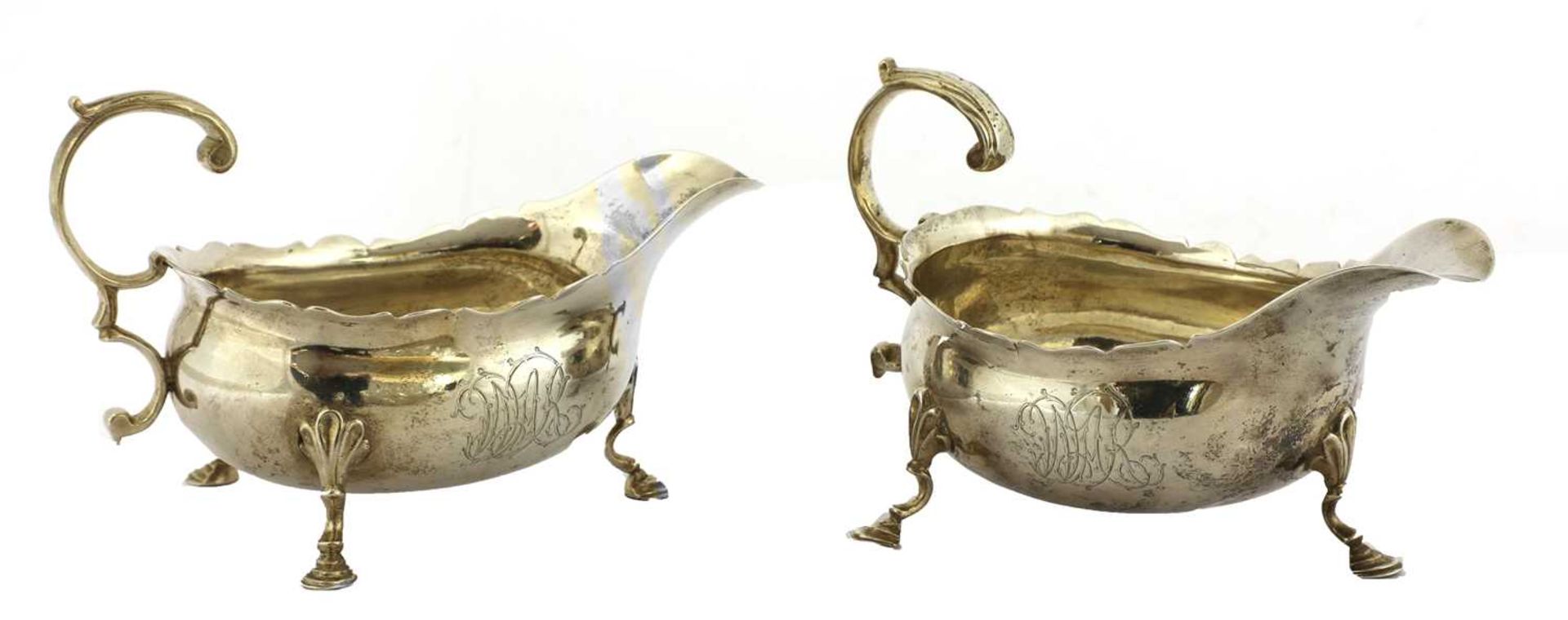 A pair of silver sauce boats,