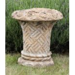 A composite stone basket weave urn,