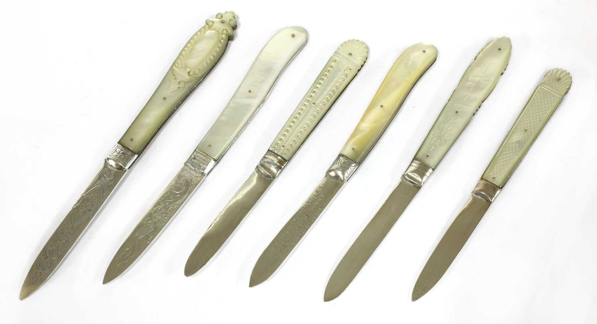 Six silver and mother-of-pearl folding fruit knives,