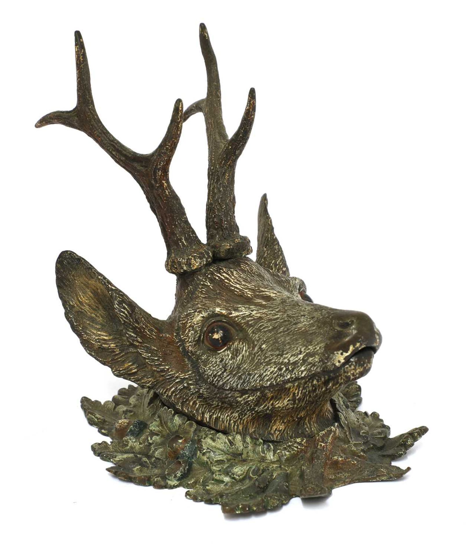 A Viennese cold painted bronze stag's head inkwell,