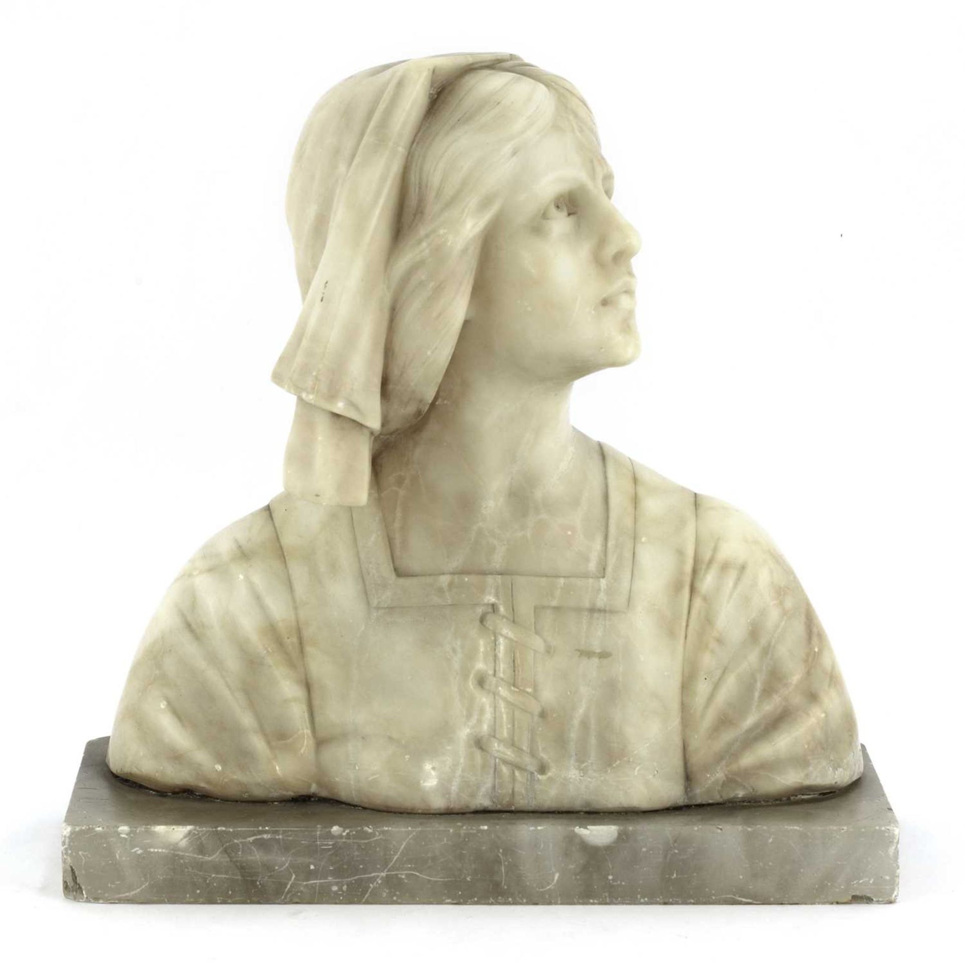 An alabaster bust of a Florentine youth,