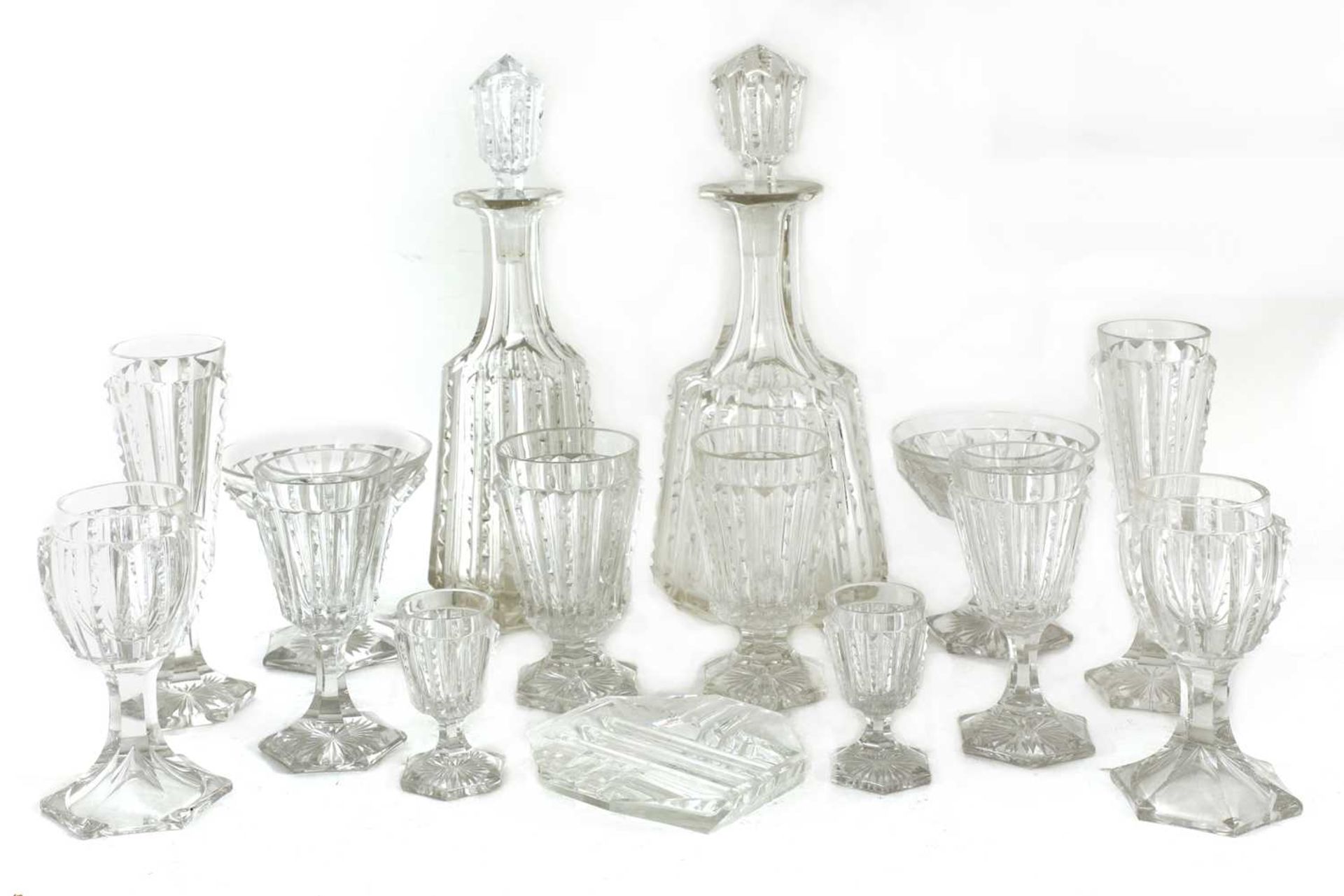 A large early cut glass suite in the manner of Baccarat,