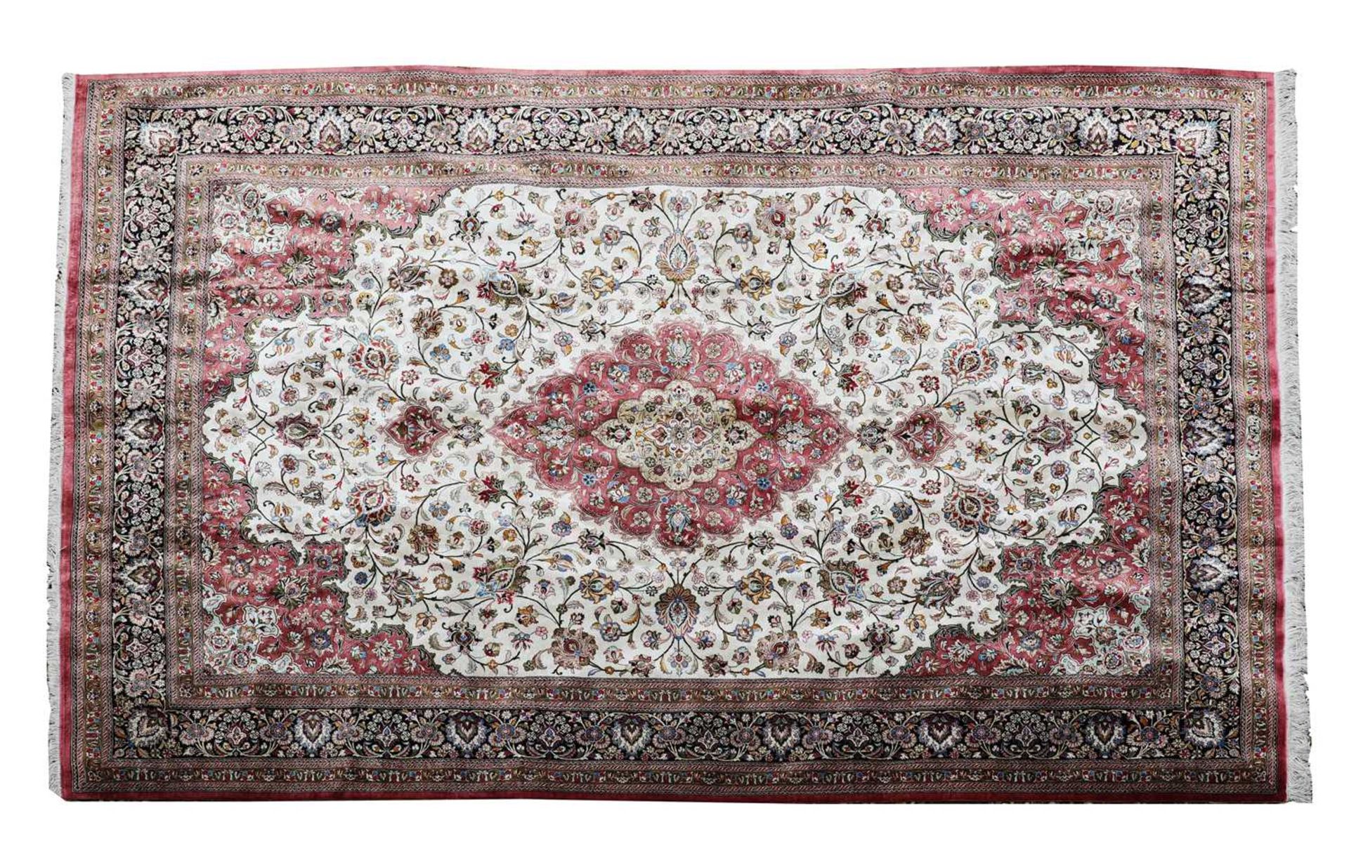 A fine Persian silk Qom rug,