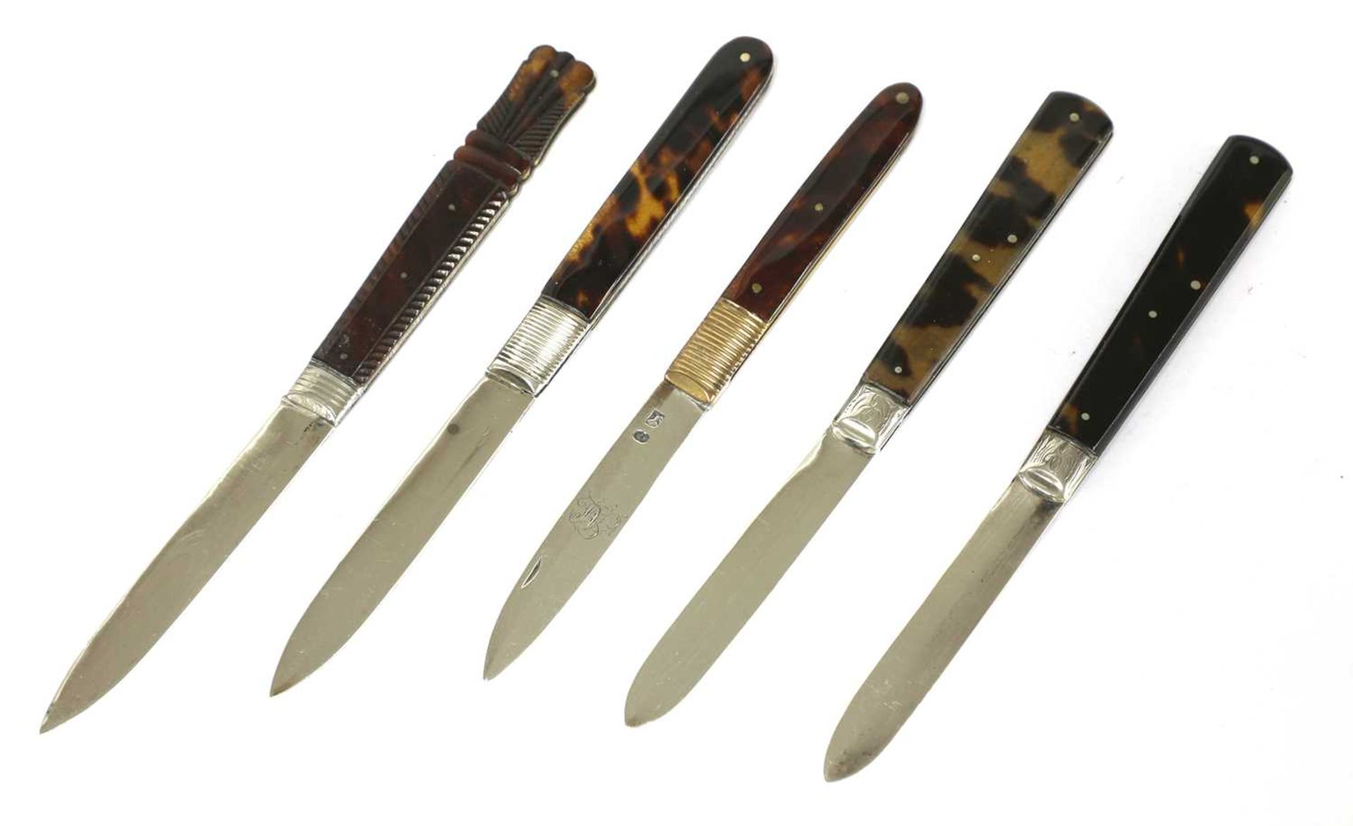 Five silver and tortoiseshell folding fruit knives,