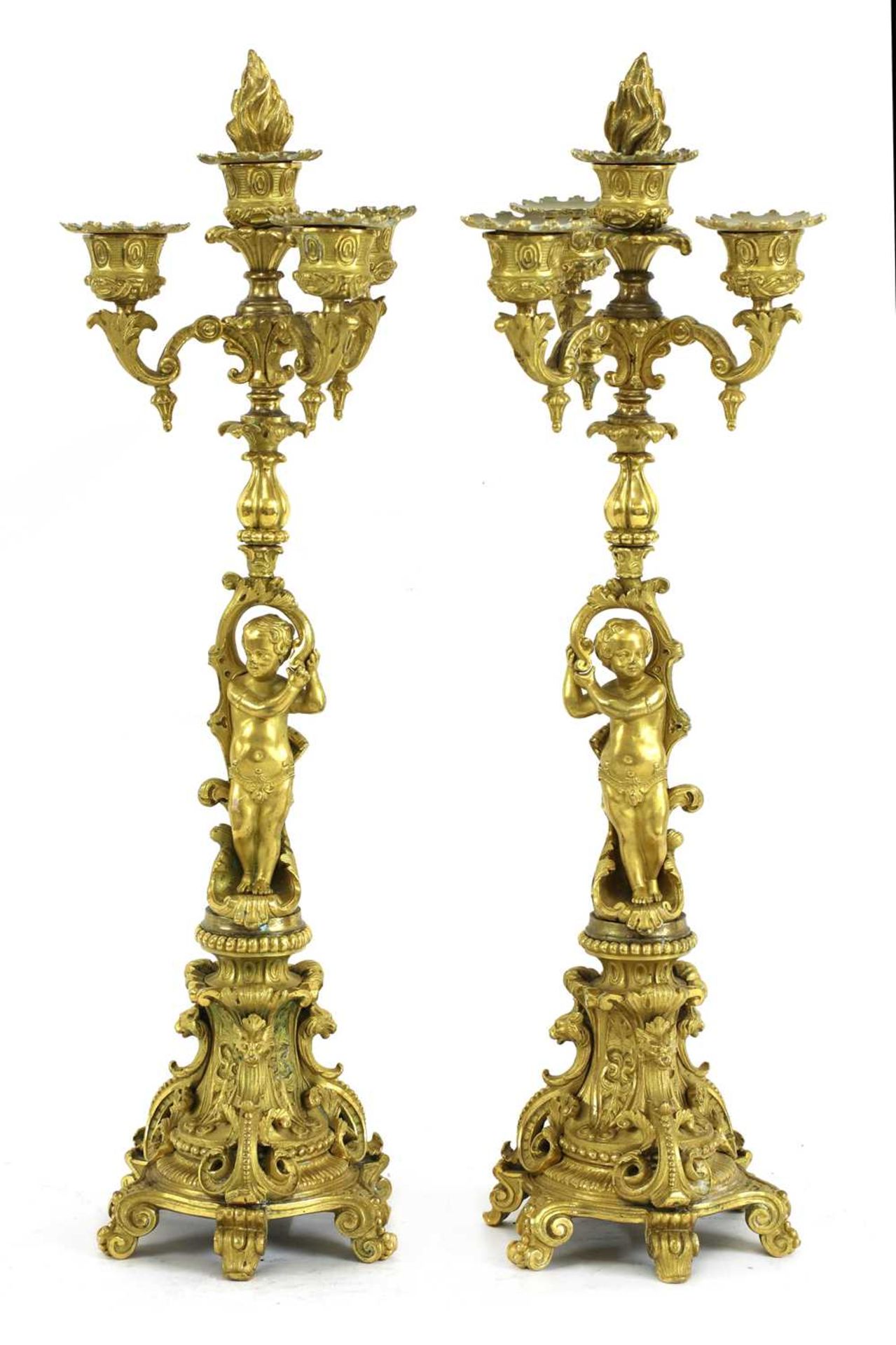 A pair of Continental ormolu four-light candelabra
