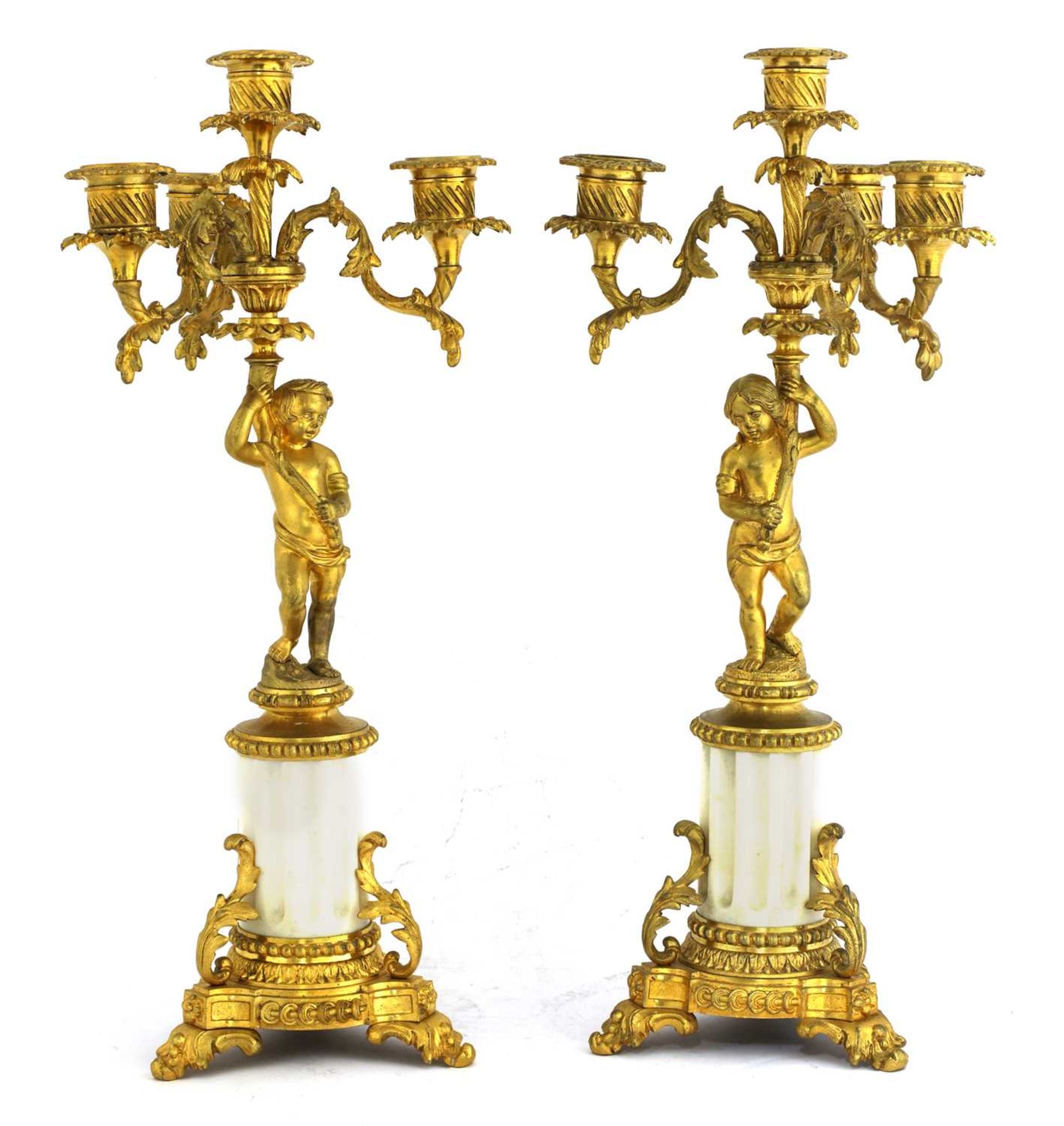 A pair of Gustavian ormolu and marble-mounted four-branch candelabra,