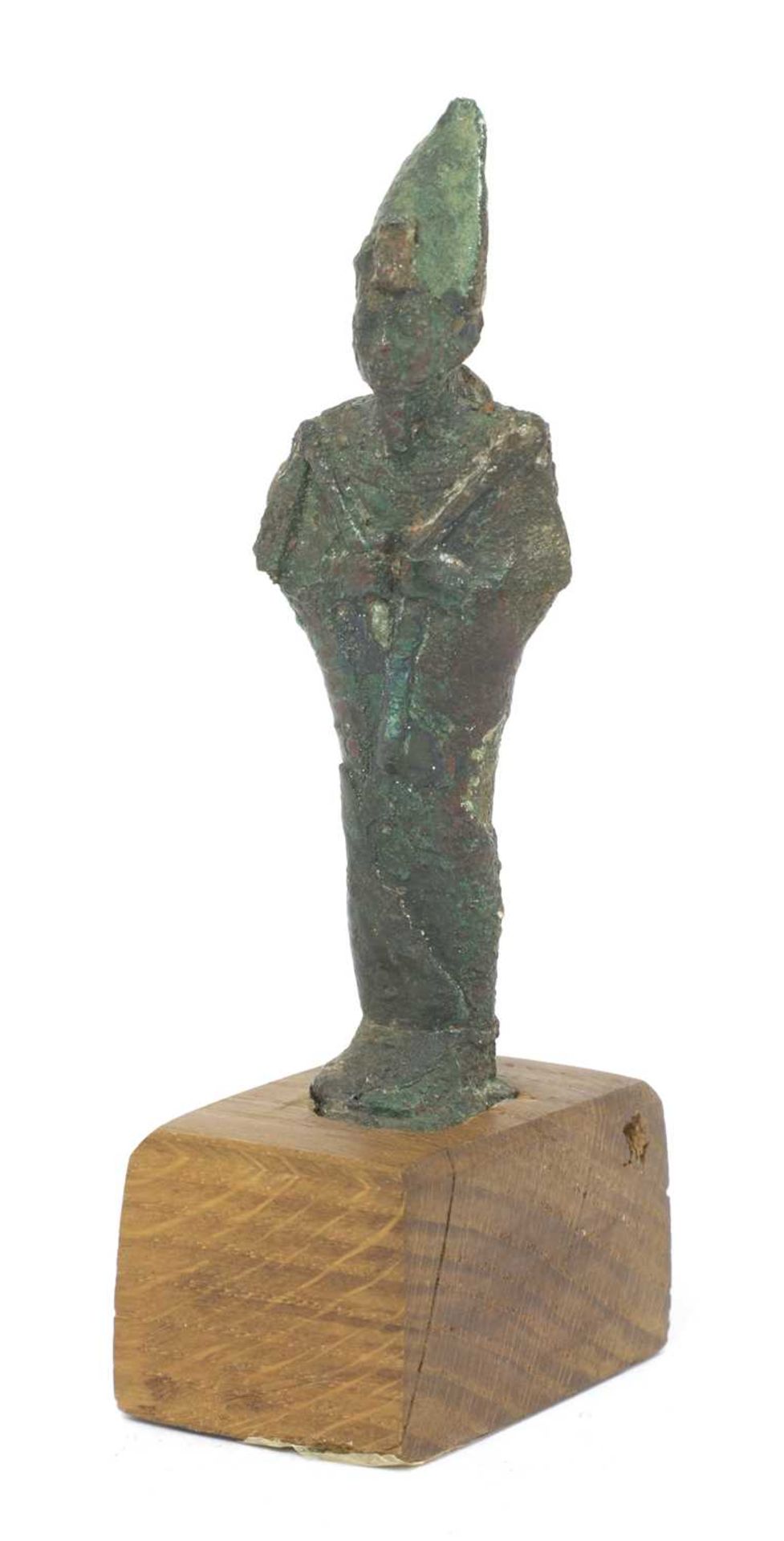 An ancient Egyptian bronze figure of Osiris,