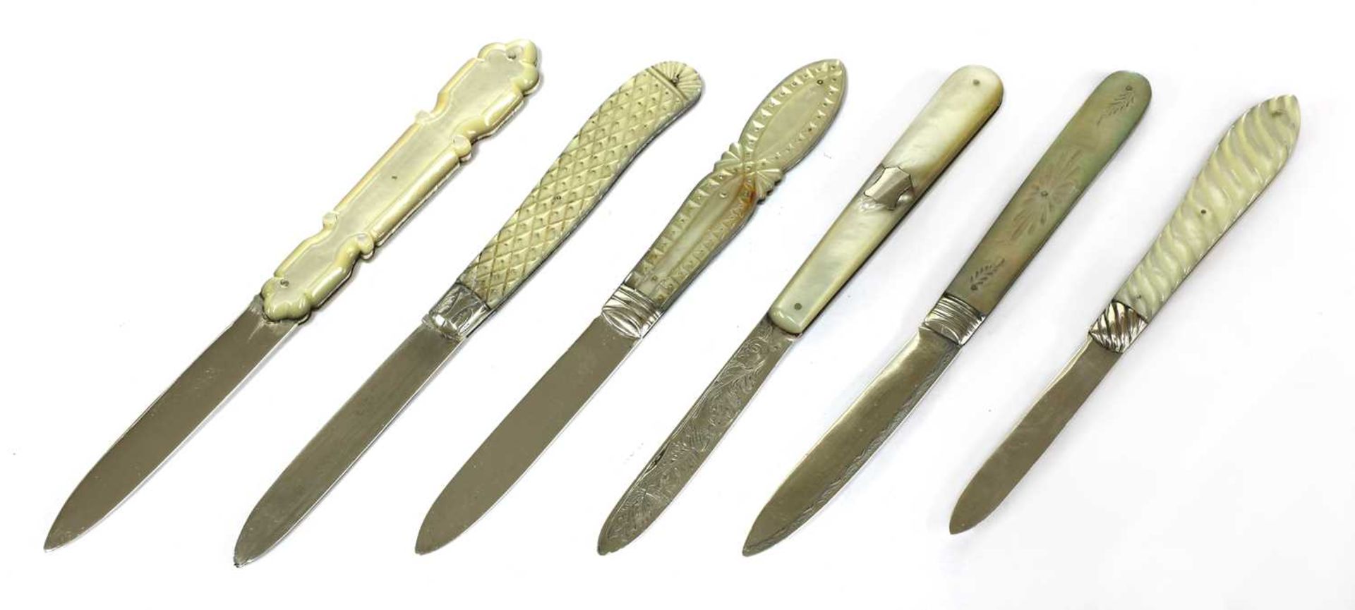 Six silver and mother-of-pearl folding fruit knives,