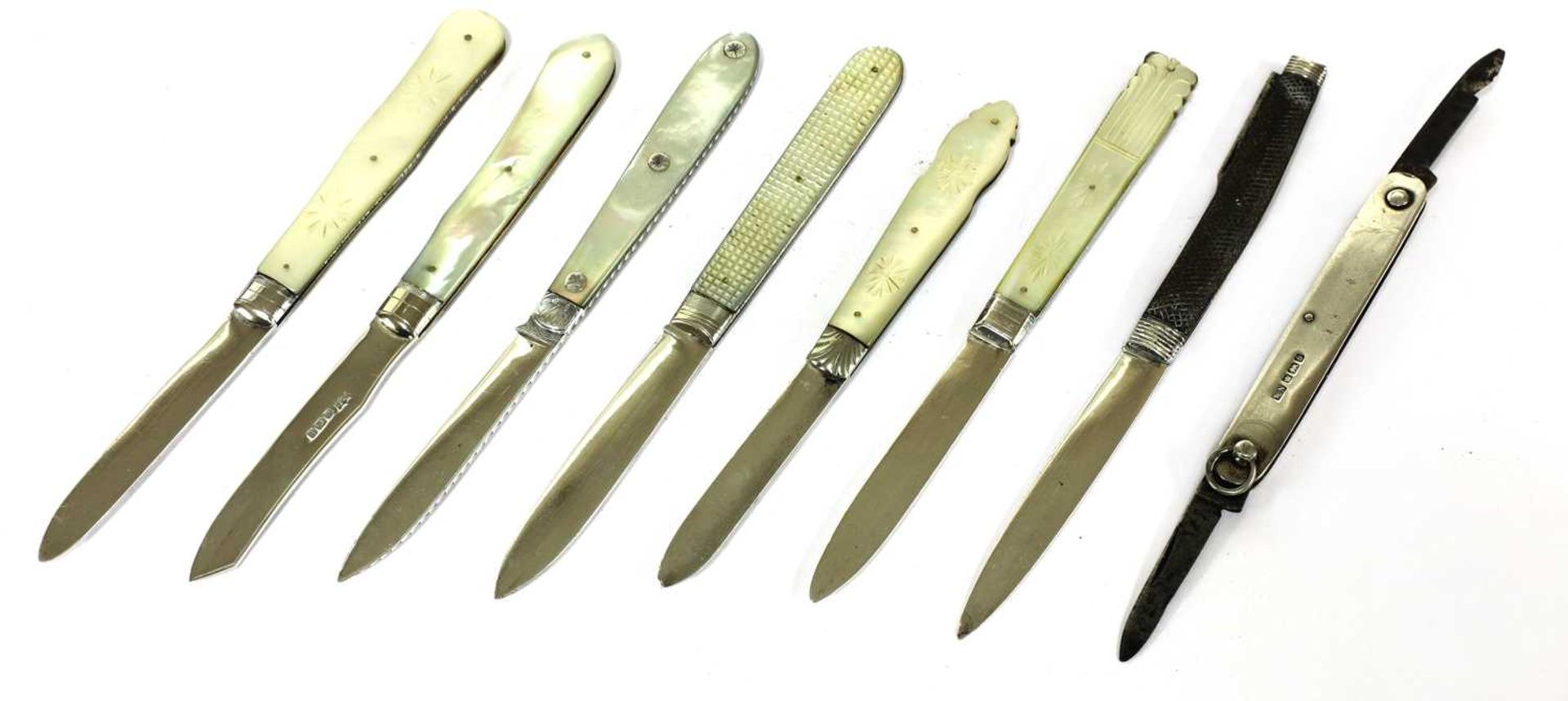 Five silver, mother-of-pearl and horn folding fruit knives, a penknife and two others,