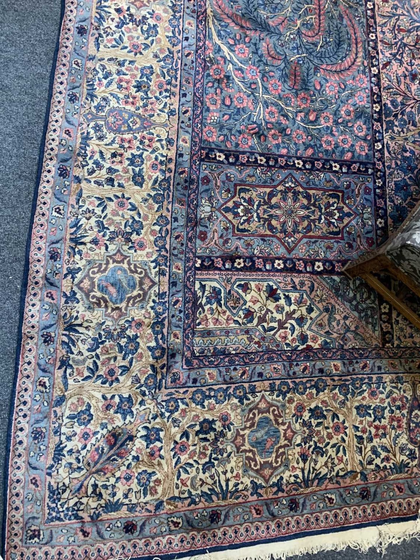 A large Persian Kirman carpet, - Image 8 of 18