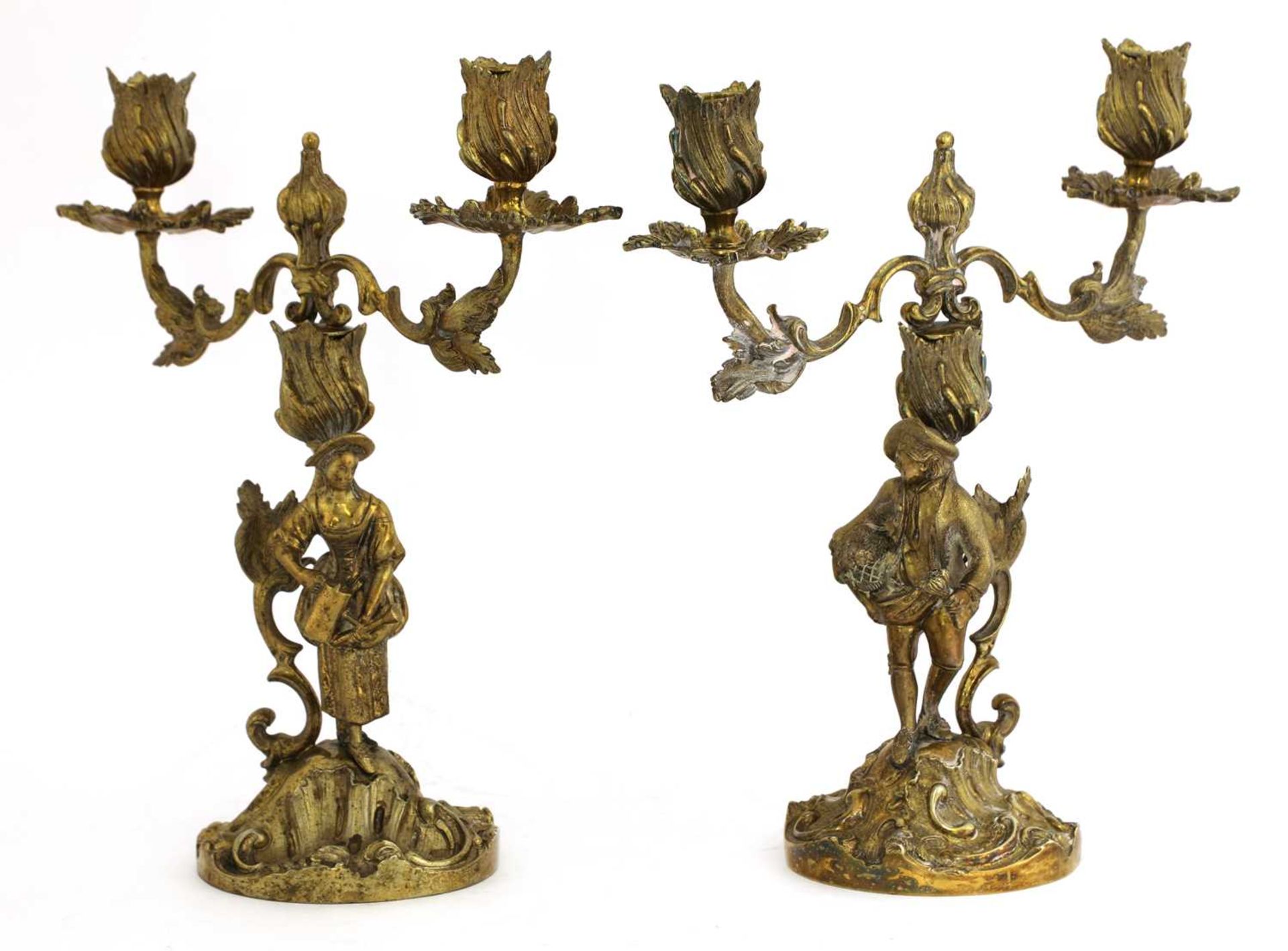 A pair of Elizabeth II silver gilt figural candelabra,