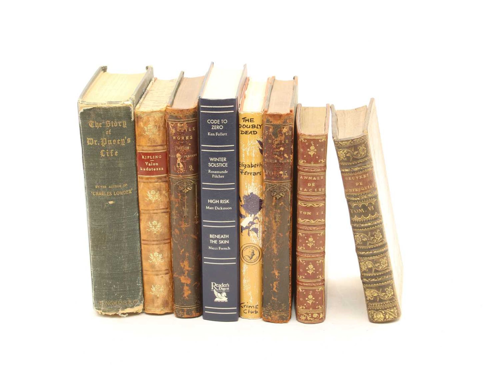 A large collection of leather bound and other books,