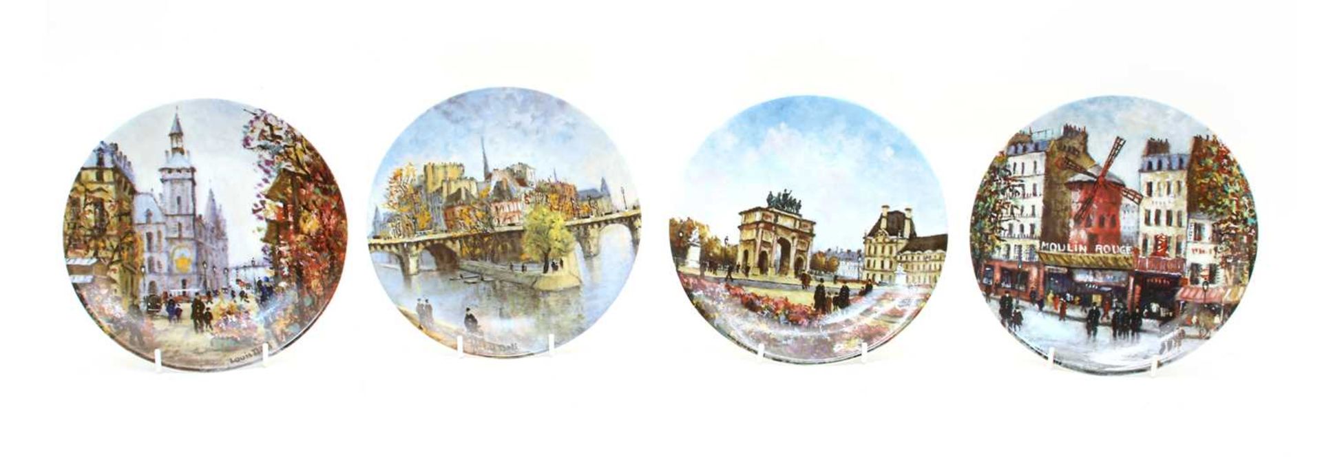 A collection of twelve Limoge limited edition plates,