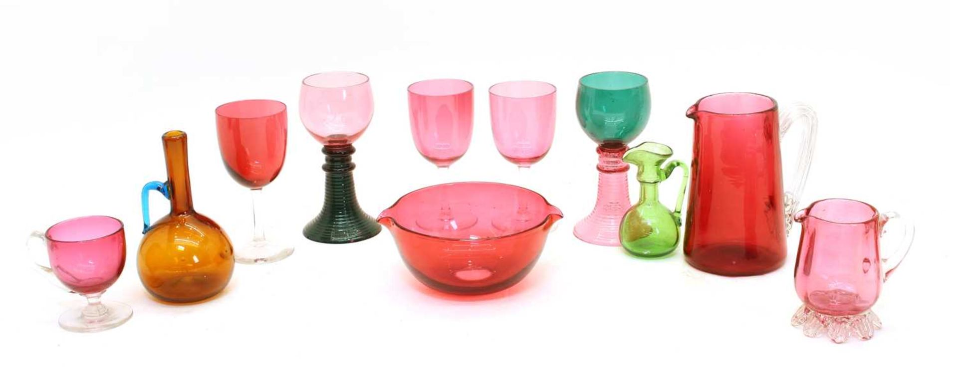 A collection of cranberry glass,