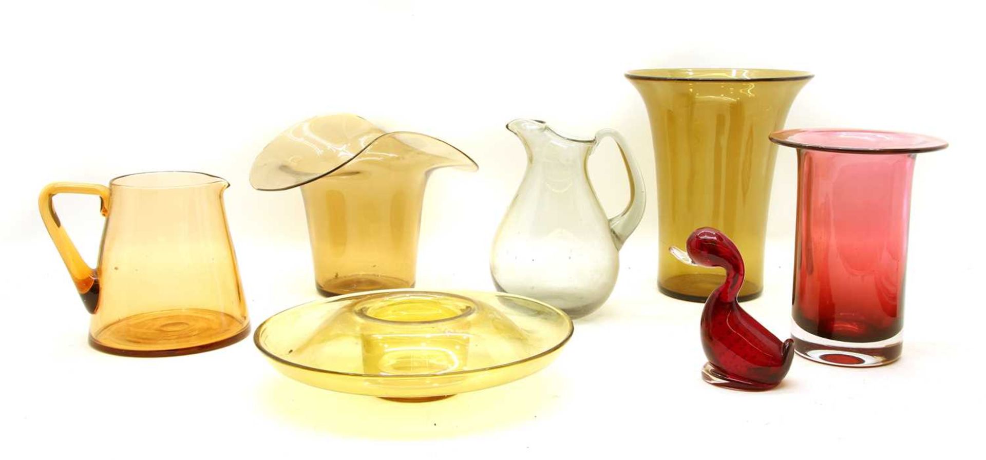 A collection of mixed coloured glassware, / Twenty-two glass mouth blown glass roundels,
