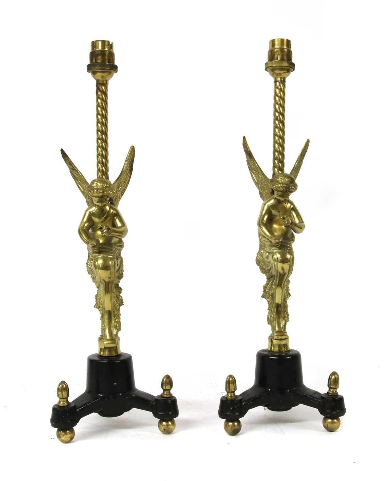 A pair of decorative brass table lamps,