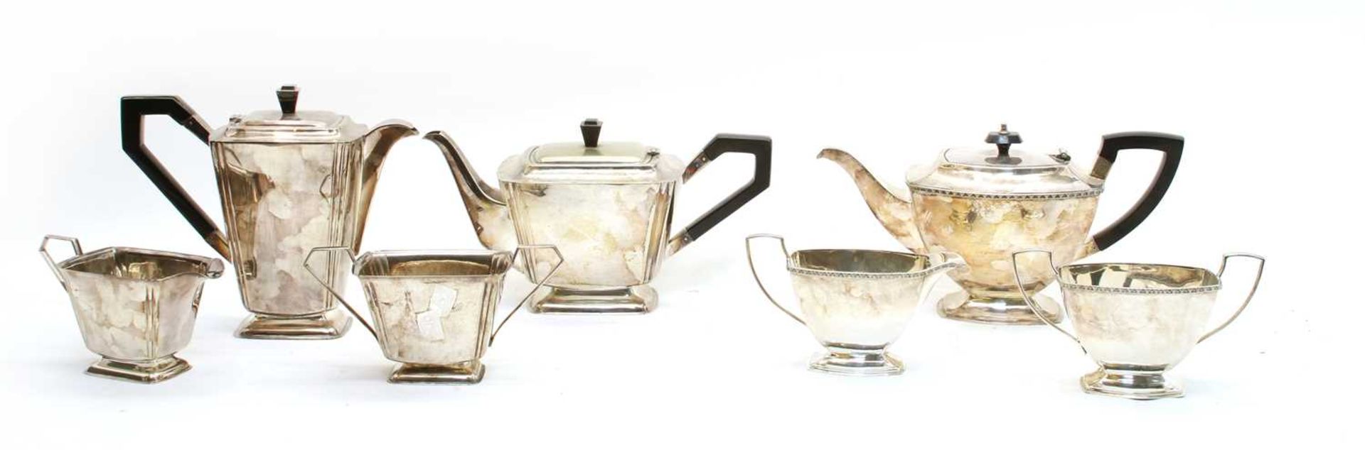Two silver plated tea services