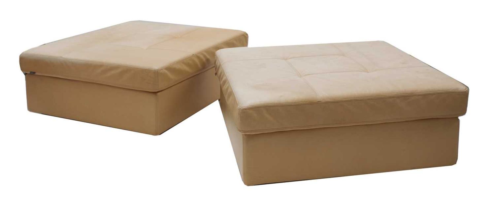 A pair of Danish tan leather pouffes,