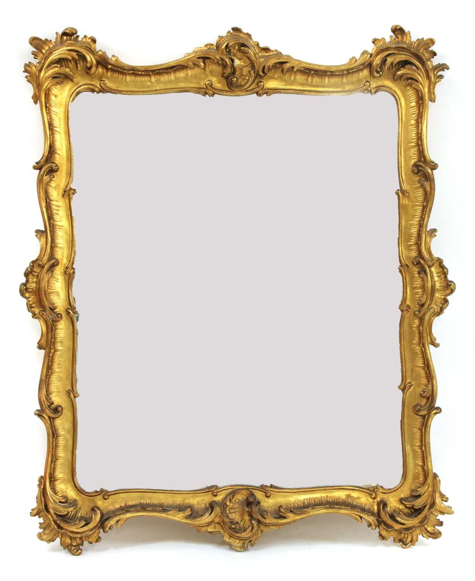 A gilt framed rectangular rococo style mirror