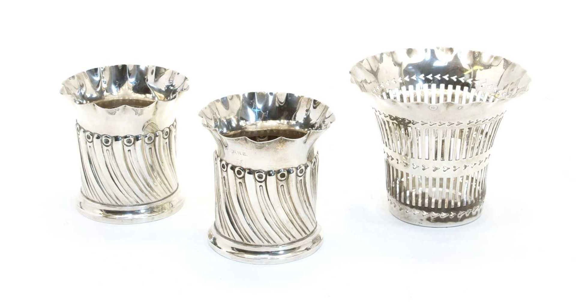 A pair of Victorian silver vases,