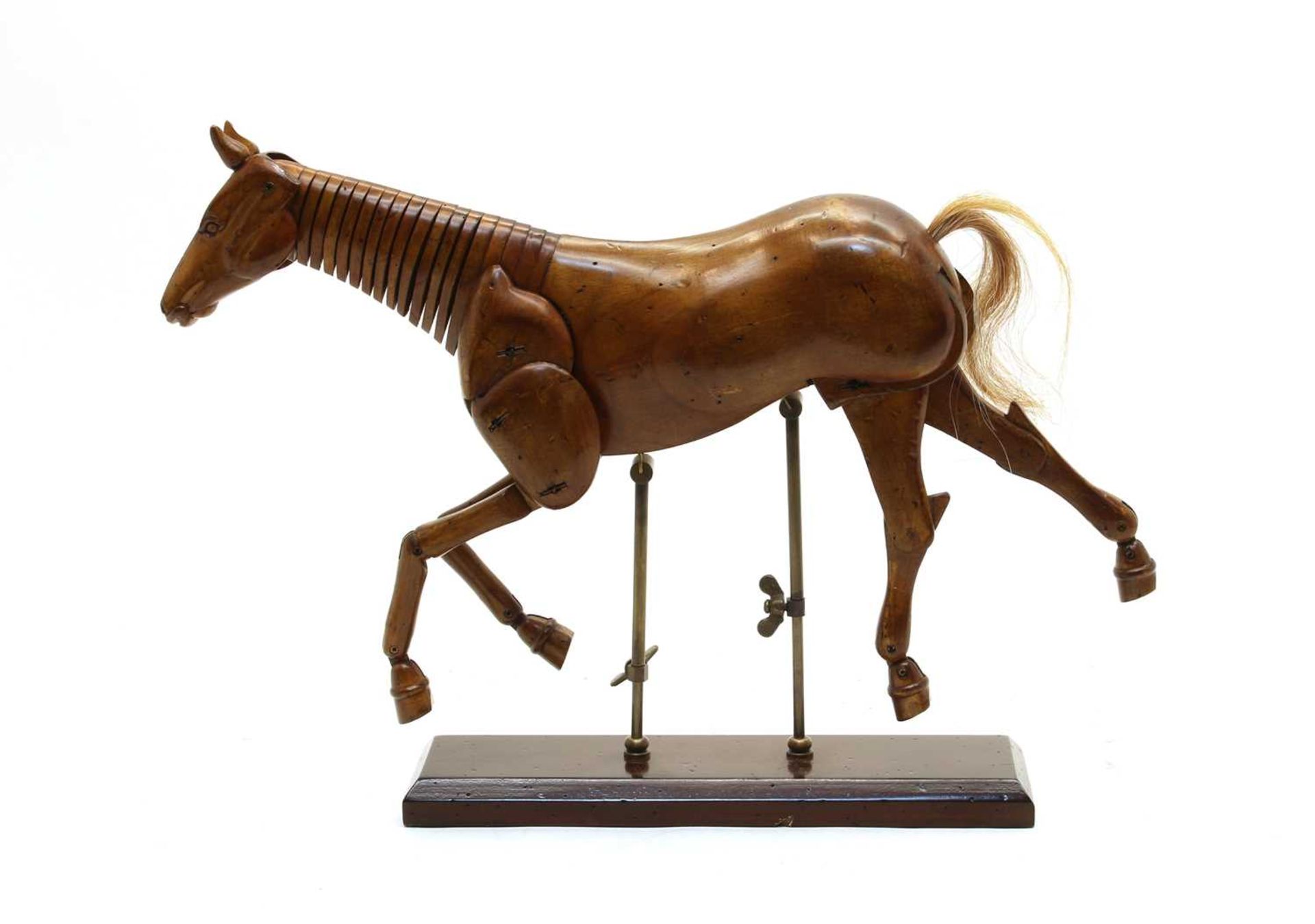 A carved wooden articulated horse - Image 2 of 2