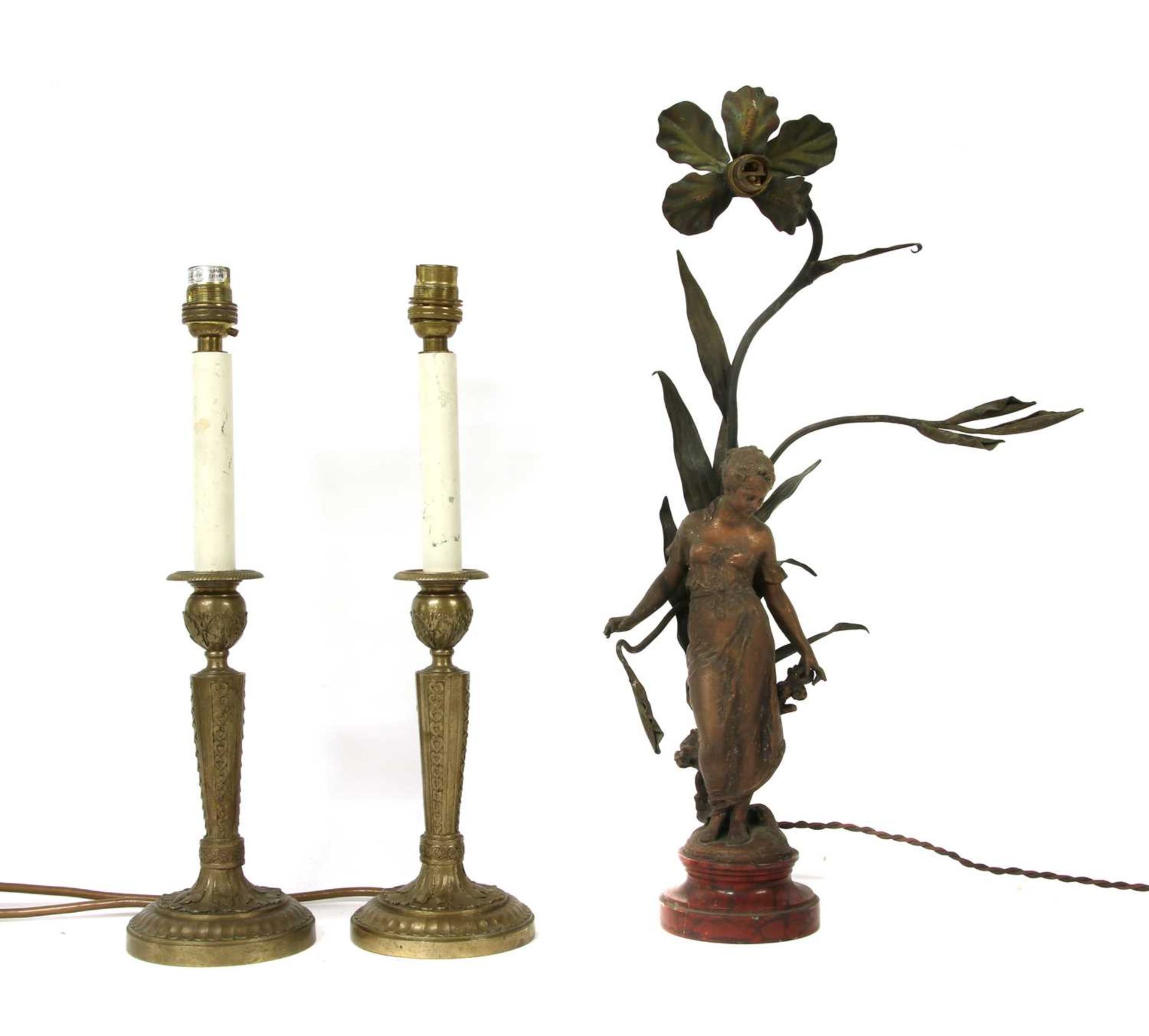 A pair of Neoclassical brass table lamps,