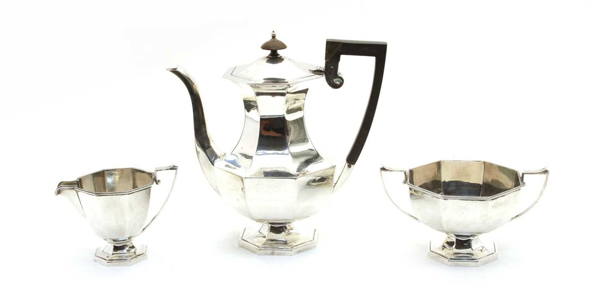 A Geore V three piece silver tea set,