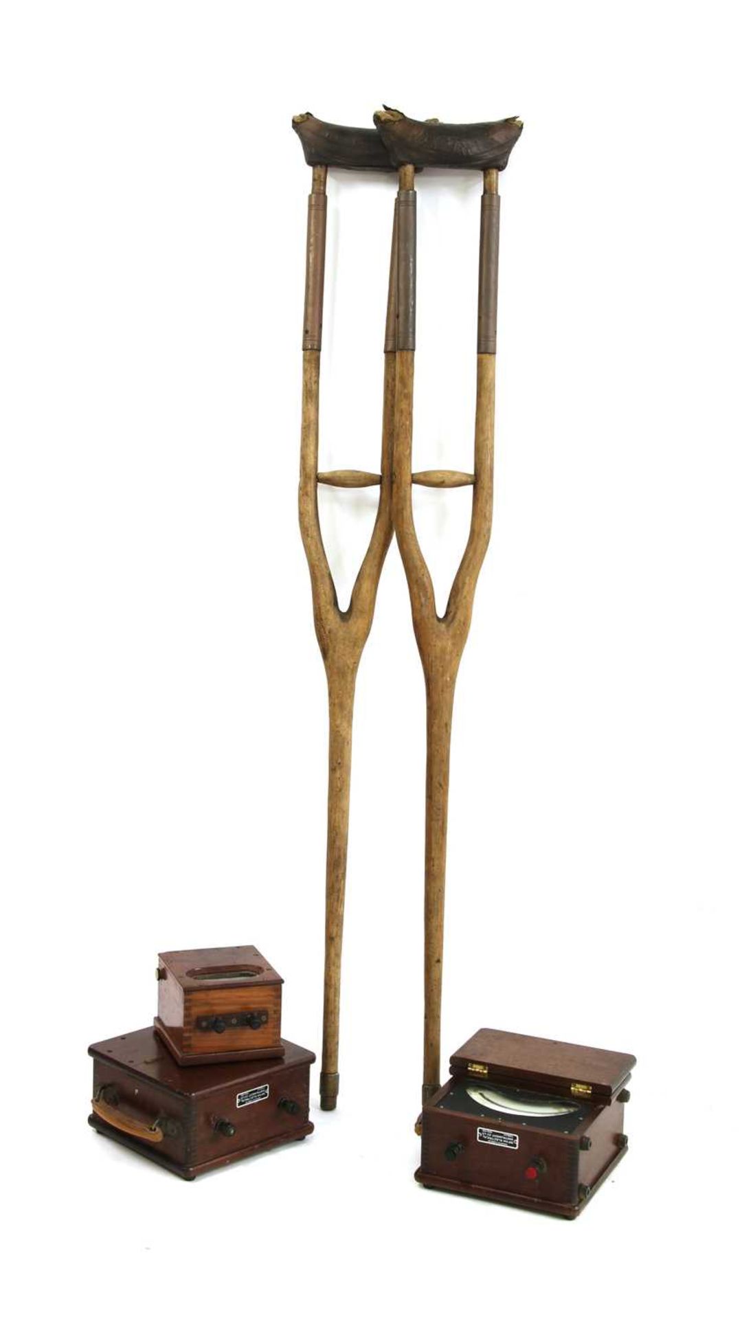 A pair of wooden crutches,