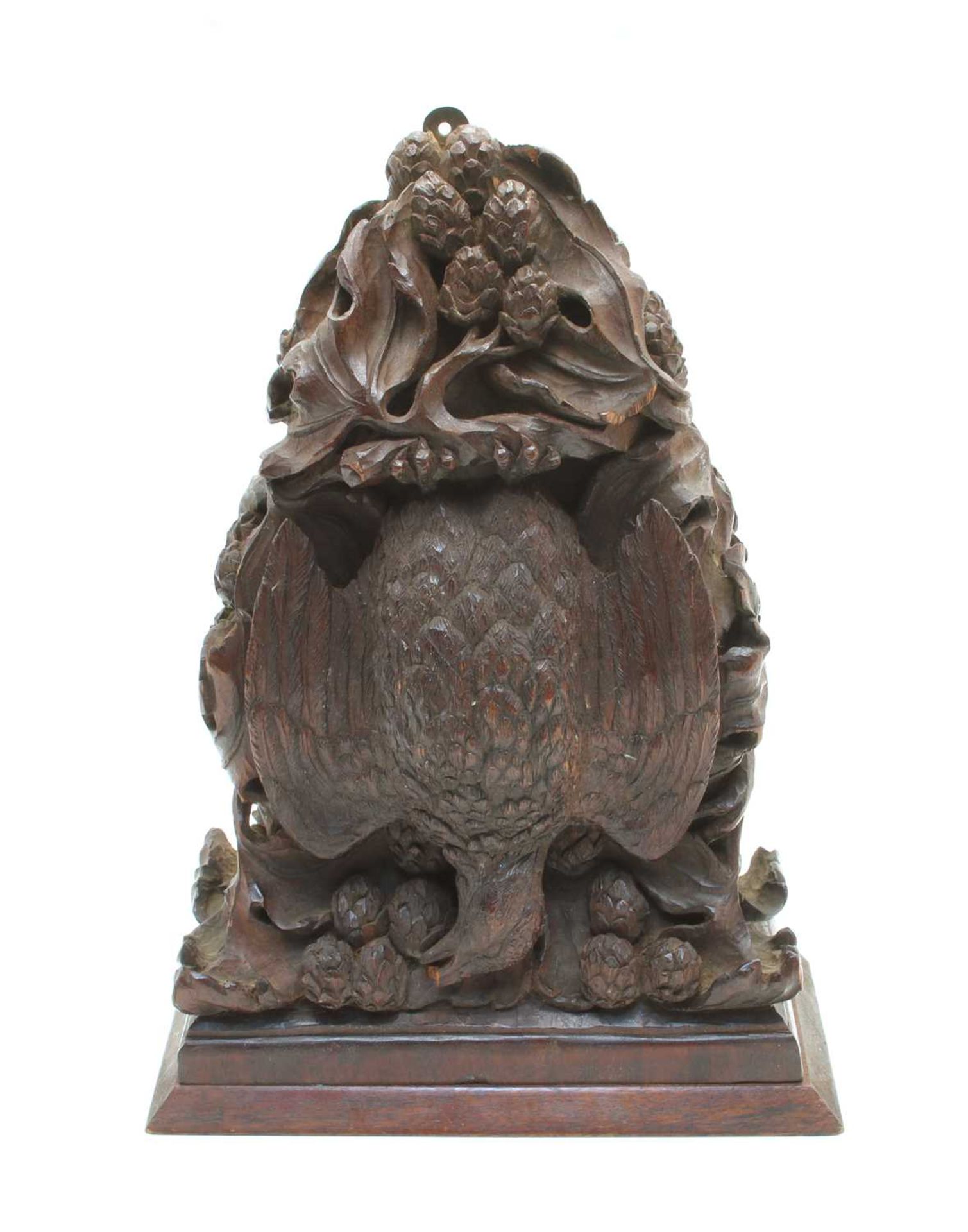 A Black Forest style carved mahogany wall bracket,