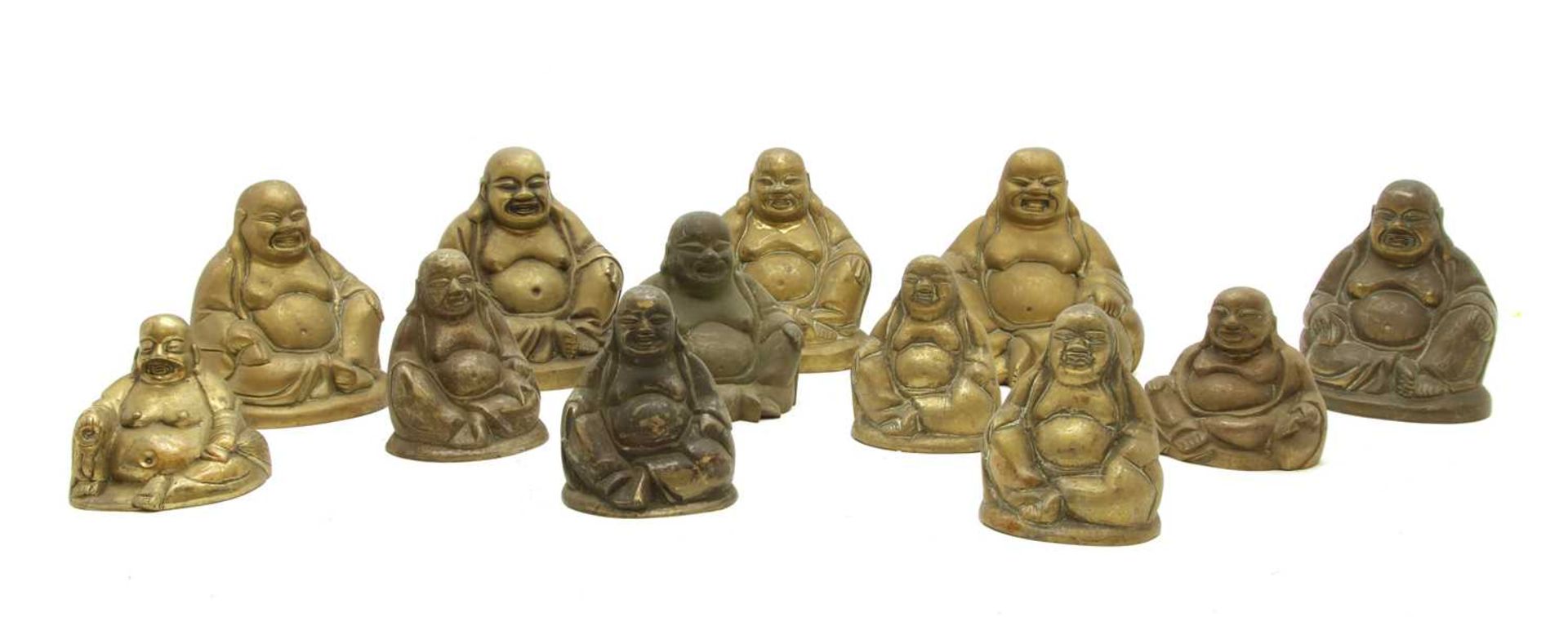 A collection of brass Buddhas,