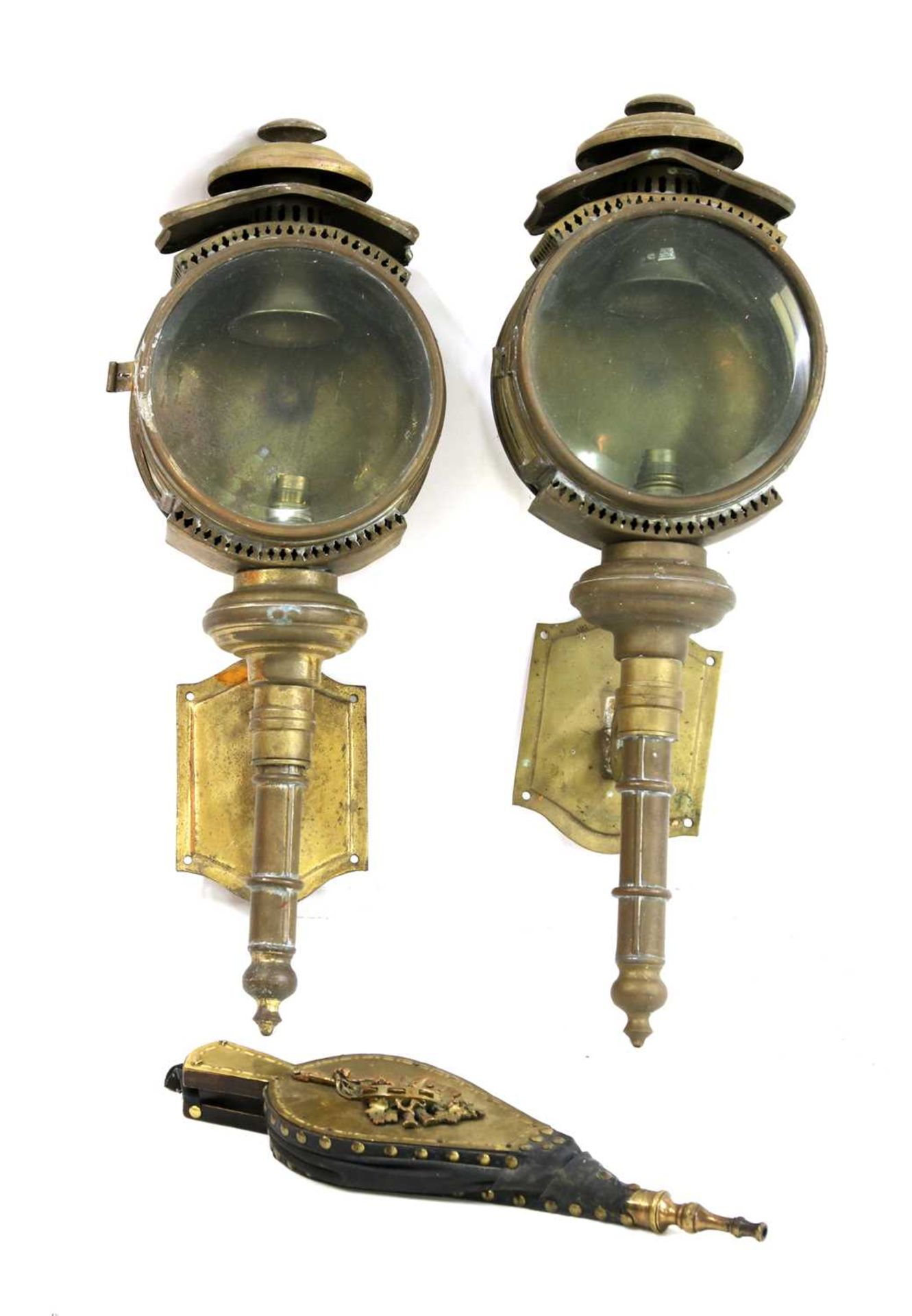 A pair of large brass coaching lamps,