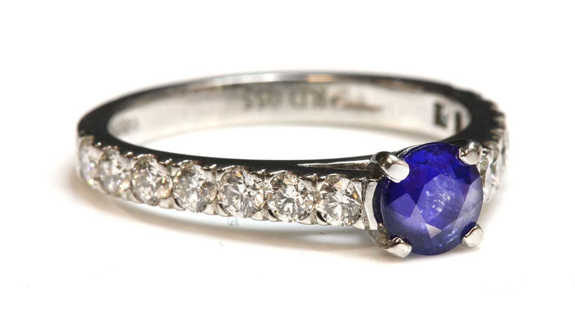 A platinum sapphire and diamond ring,