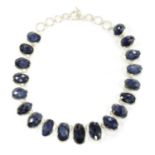 A silver graduated sapphire necklace,