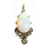 A gold and silver, opal and diamond pendant