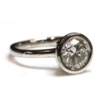 A platinum single stone diamond ring,