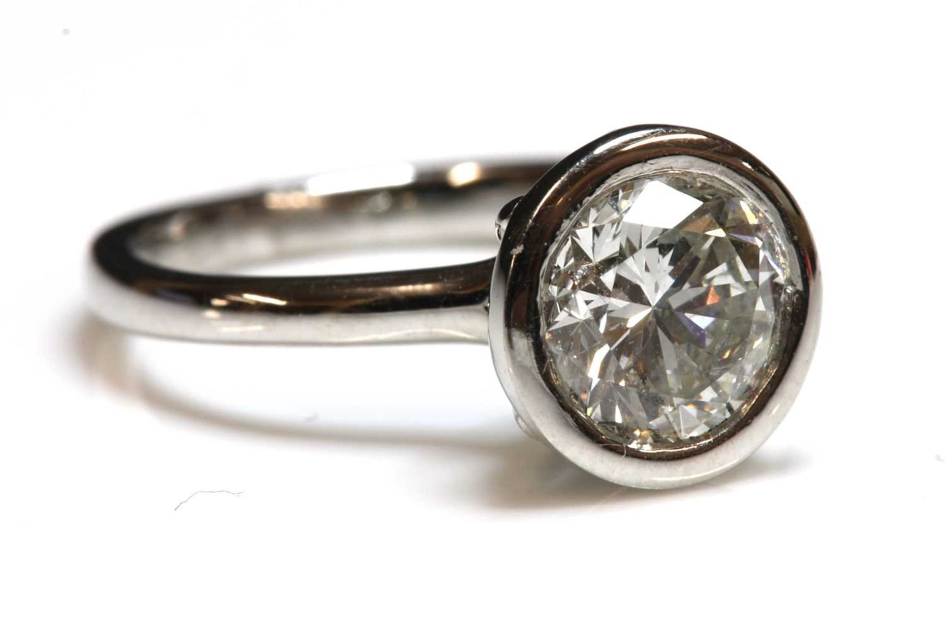 A platinum single stone diamond ring,