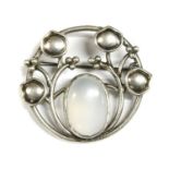 An Arts & Crafts style moonstone brooch,